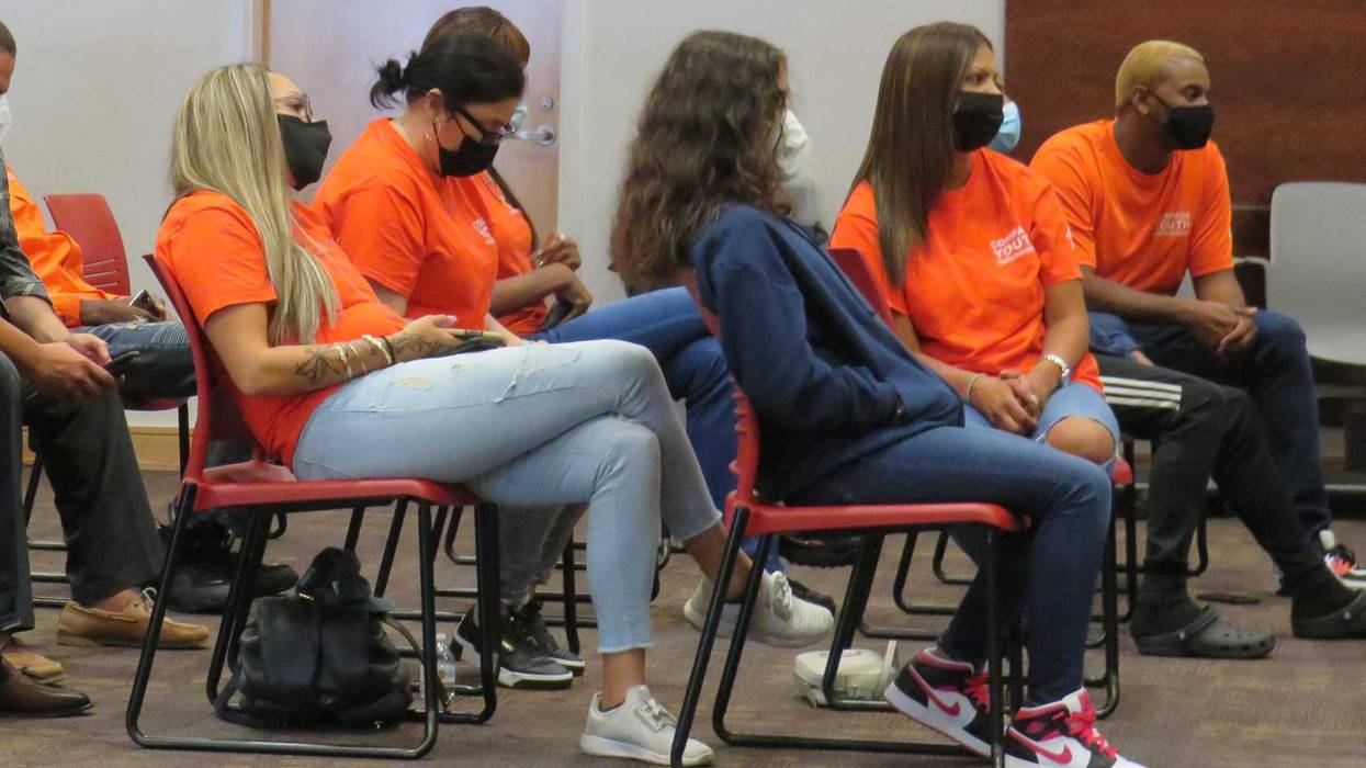Peacebuilders from COMPASS Youth Collaborative attend an event announcing new funding for Hartford youth organizations, Hartford Public Library, 8/4/21