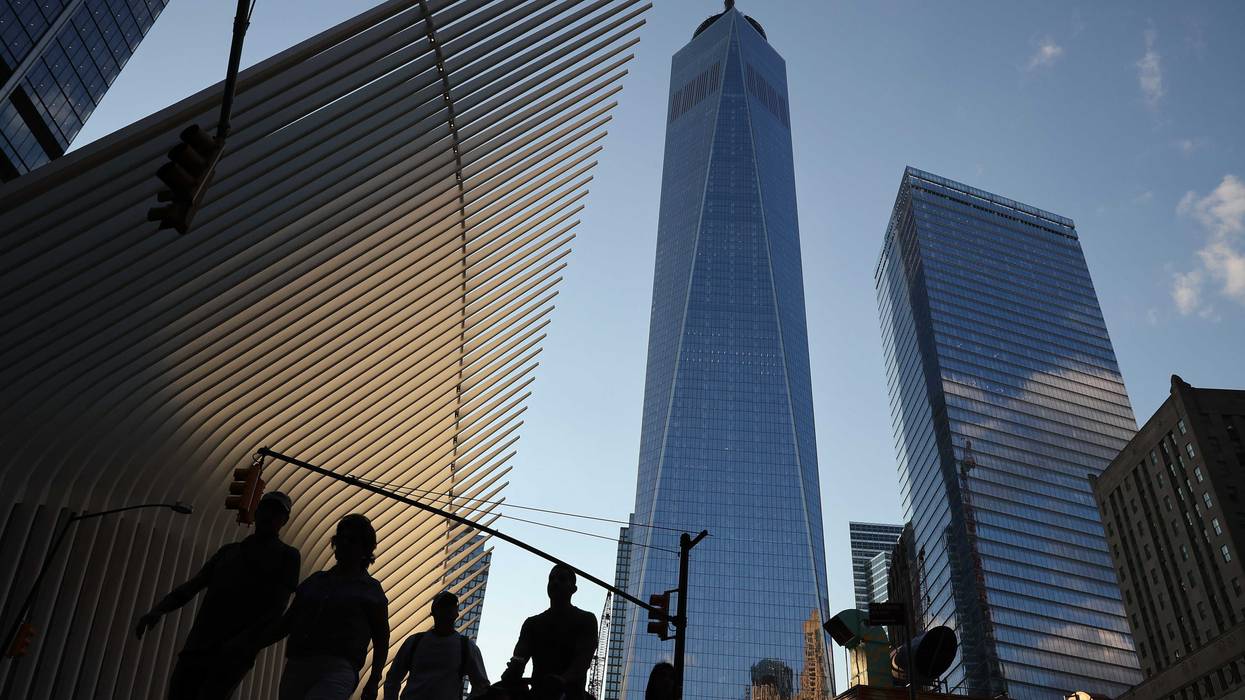 Pedestrians cross Church Street near the September 11 Memorial on September 06, 2021 in New York City.