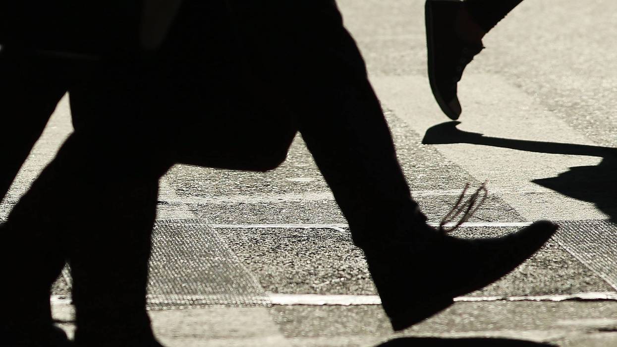 Pedestrians cross the intersection of 3rd Avenue and 14th Street, one of Manhattan's most dangerous crosswalks for pedestrians, on October 27, 2014 in New York City.