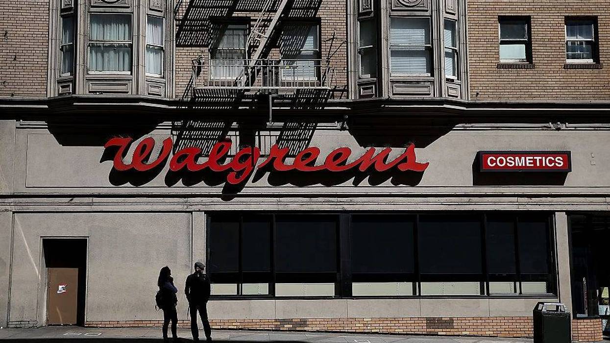 Pedestrians walk by a Walgreens store on April 5, 2016 in San Francisco, California.