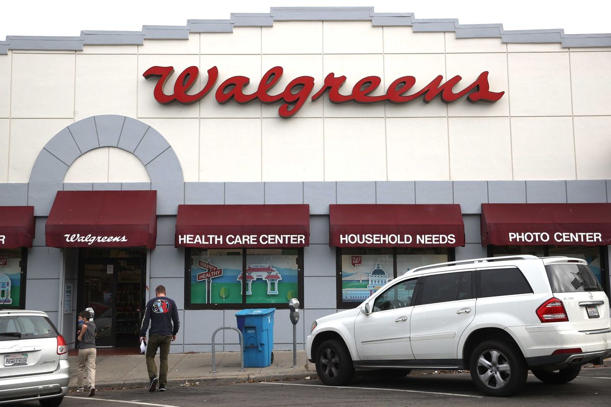 Pedestrians walk by a Walgreens store that is set to be closed in the coming weeks on October 13, 2021 in San Francisco, California.
