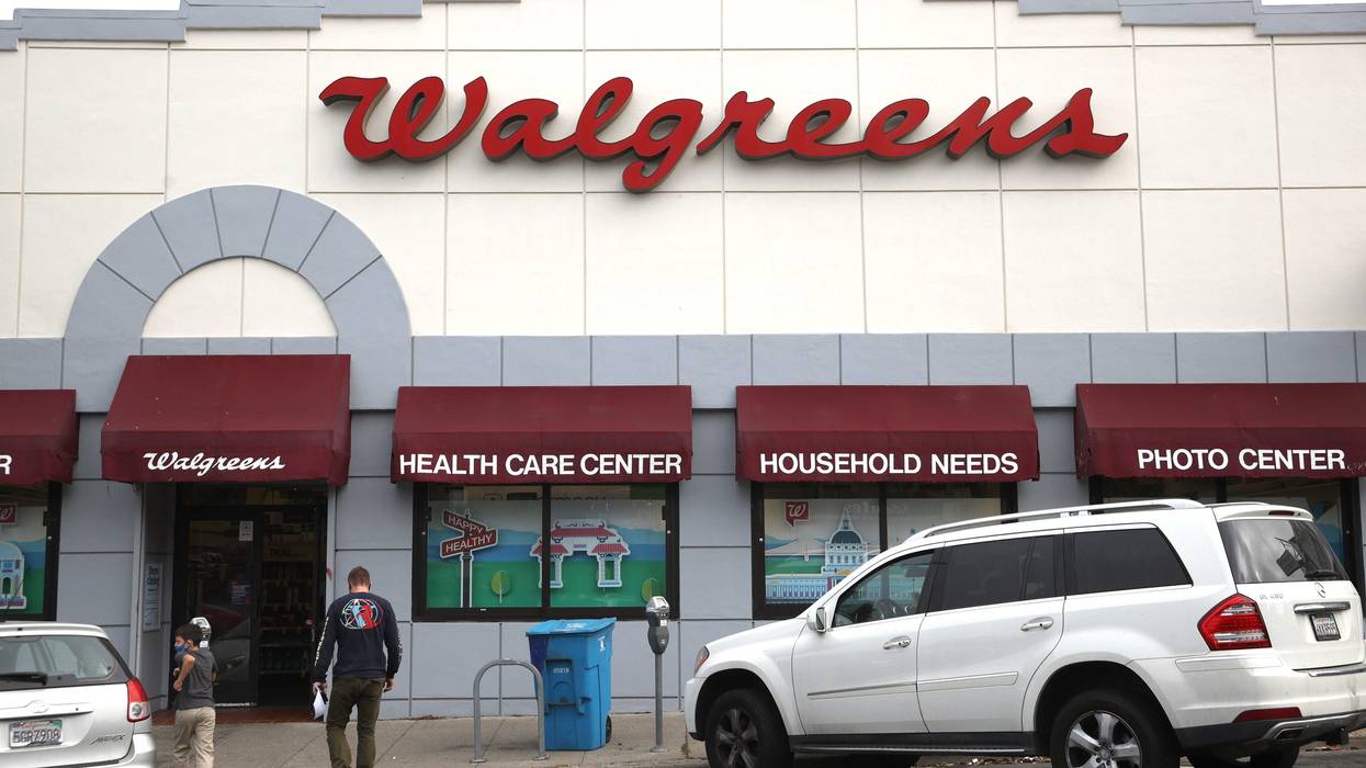 Pedestrians walk by a Walgreens store that is set to be closed in the coming weeks on October 13, 2021 in San Francisco, California.