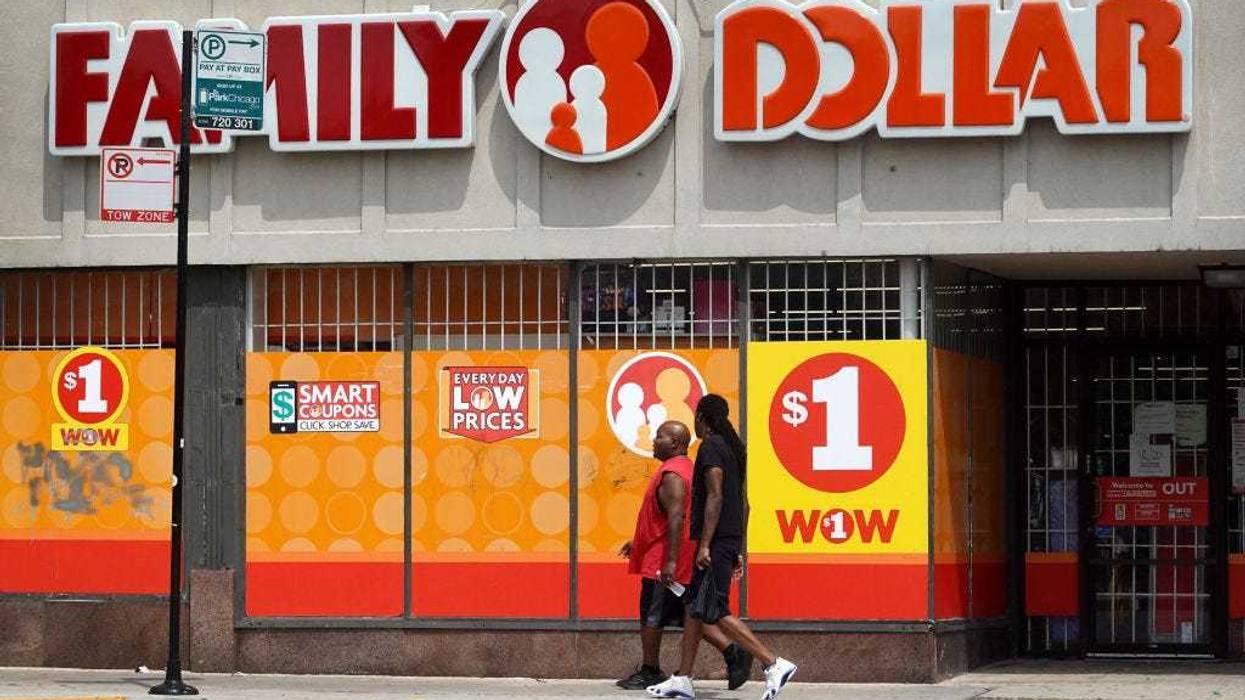 Pedestrians walk past a Family Dollar store in the Humboldt Park neighborhood on August 02, 2022 in Chicago, Illinois. \