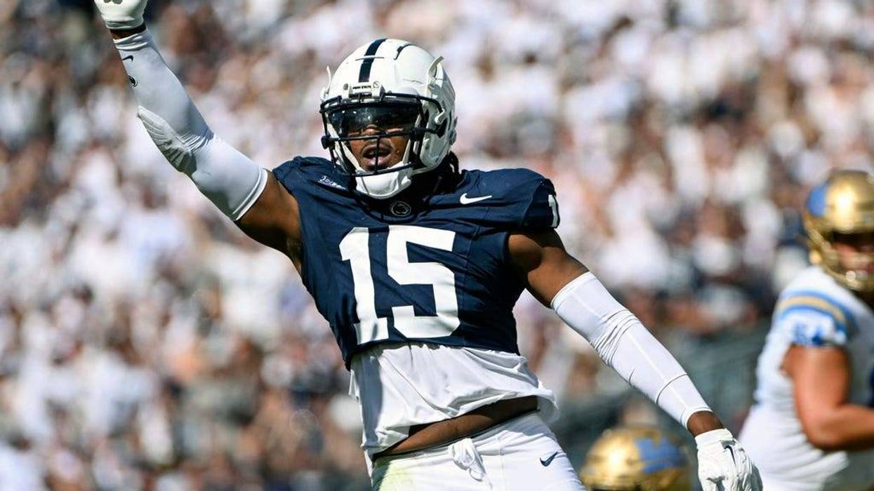 Penn State defensive end Amin Vanover (15) celebrates after tackling UCLA quarterback Justyn Martin (6) during the second half of an NCAA college football game, Saturday, Oct. 5, 2024, in State College, Pa.