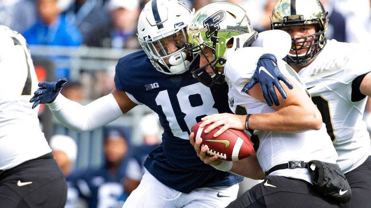 Penn State defensive end Shaka Toney (18) sacks Purdue quarterback Jack Plummer (13) in the first quarter of an NCAA college football game in State College, Pa., on Saturday, Oct. 5, 2019.