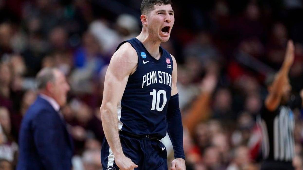 Penn State guard Andrew Funk celebrates after making a 3-point basket in the first half of a first-round college basketball game against Texas A&M in the NCAA Tournament, Thursday, March 16, 2023, in Des Moines, Iowa.