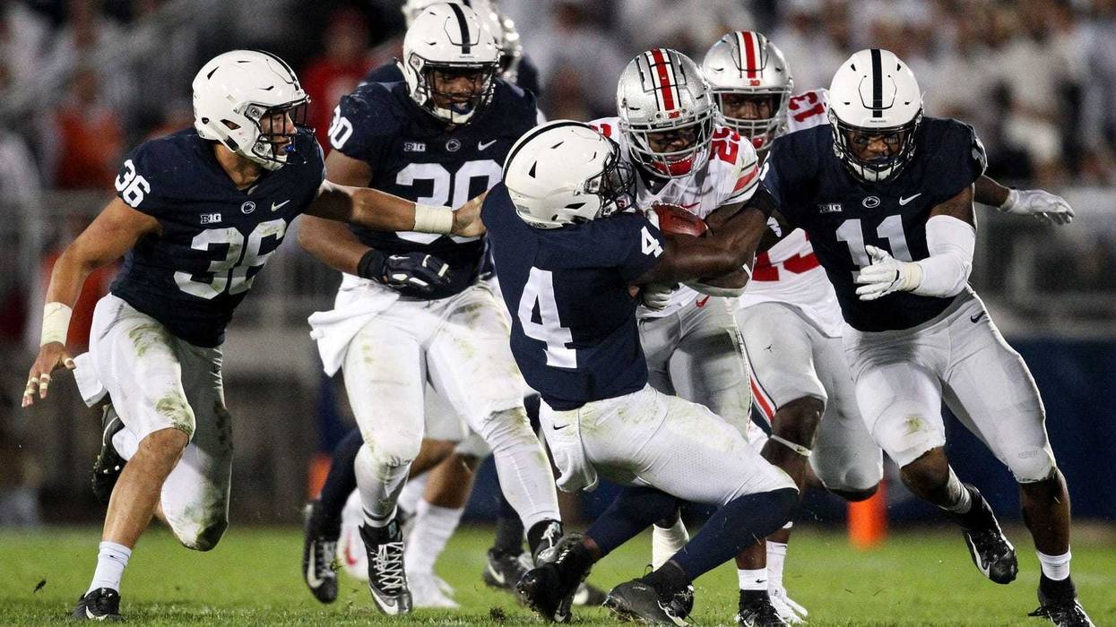 Penn State Nittany Lions safety Nick Scott (4) attempts to tackle Ohio State Buckeyes running back Mike Weber