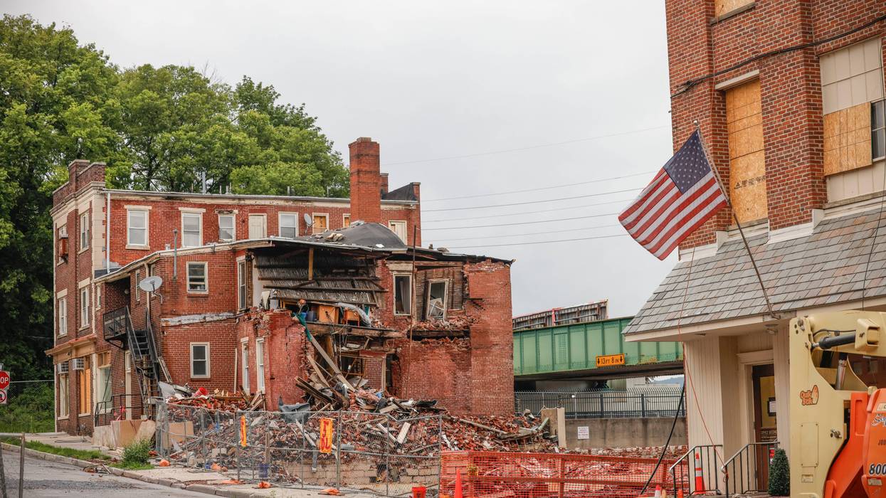 Pennsylvania Gov. Josh Shapiro, first responders, and state and local officials visit the site of the West Reading chocolate factory explosion on July 10, 2023.