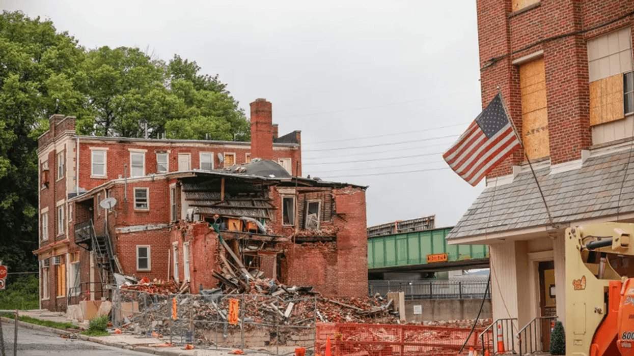 Pennsylvania Gov. Josh Shapiro, first responders, and state and local officials visit the site of the West Reading chocolate factory explosion on July 10, 2023.