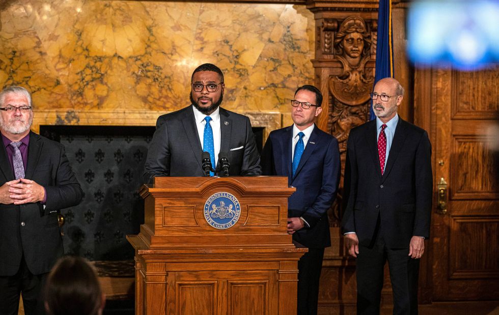 Pennsylvania Lt. Gov.-elect Austin Davis, Gov.-elect Josh Shapiro, and Gov. Tom Wolf