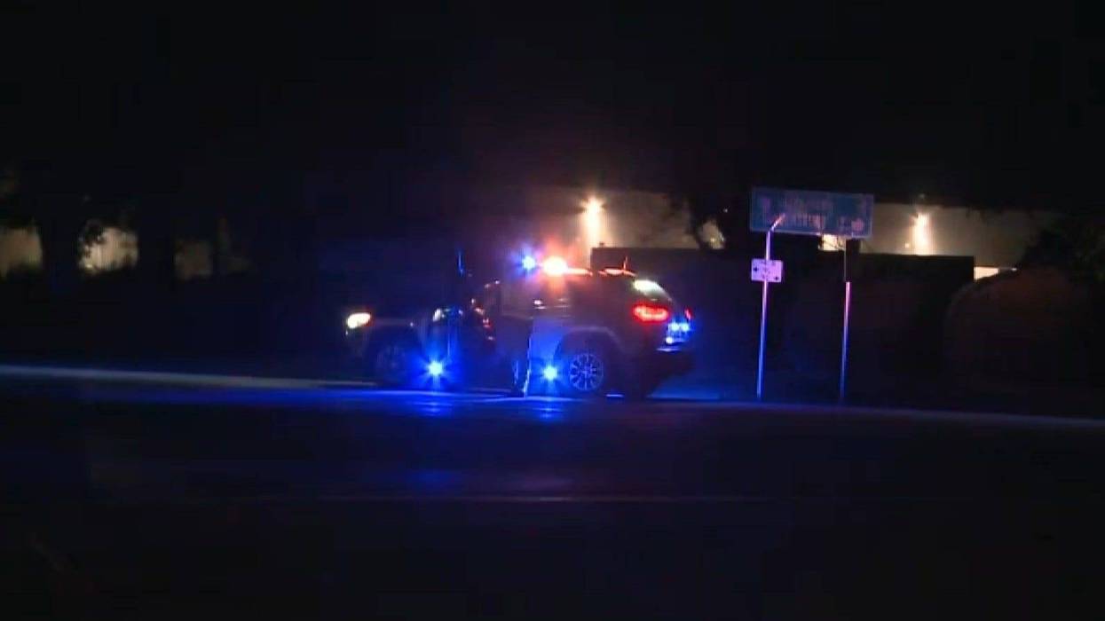Pennsylvania State Police at the scene of an trooper-involved shooting that critically wounded two troopers and killed one suspect.