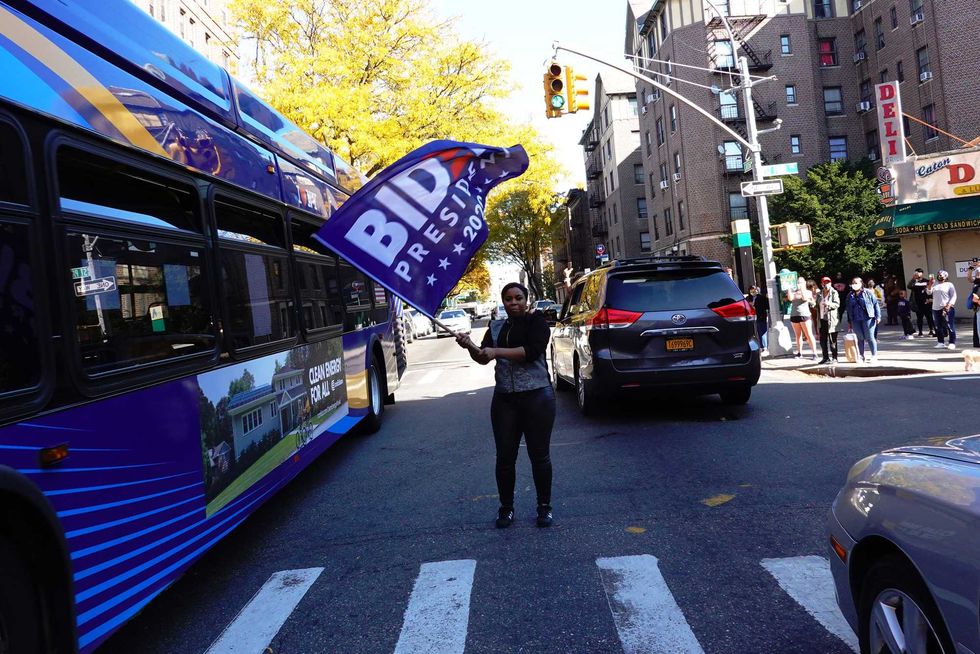 People celebrate in the Flatbush neighborhood of Brooklyn after Joe Biden was declared winner of the 2020 presidential election on November 07, 2020 in New York City.