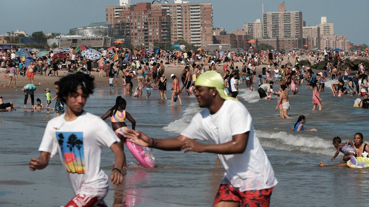 People cool off at Coney Island beach in Brooklyn on one of the first hot days of the year on June 28, 2021 in New York City