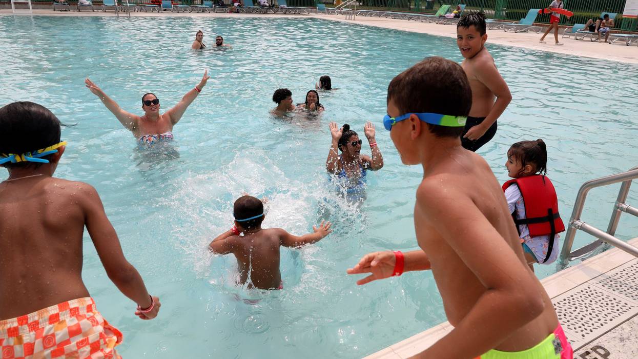 People cool off at the Playland pool in Rye this summer