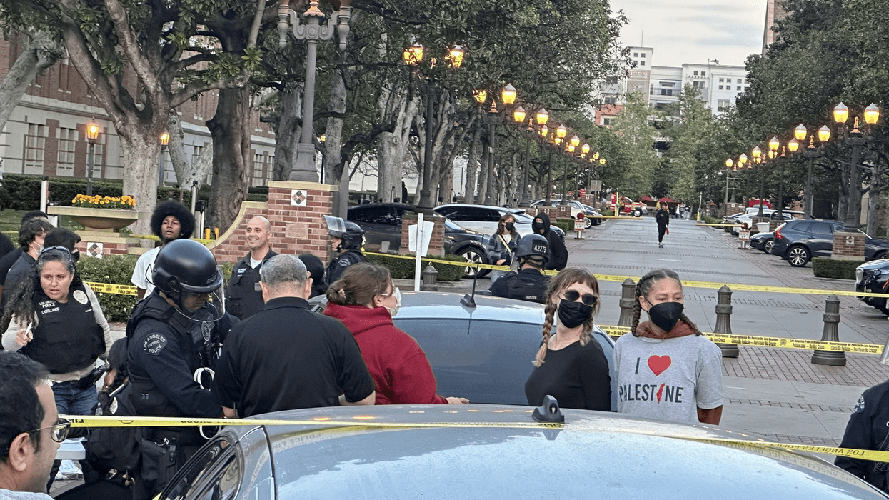 people detained between police tape