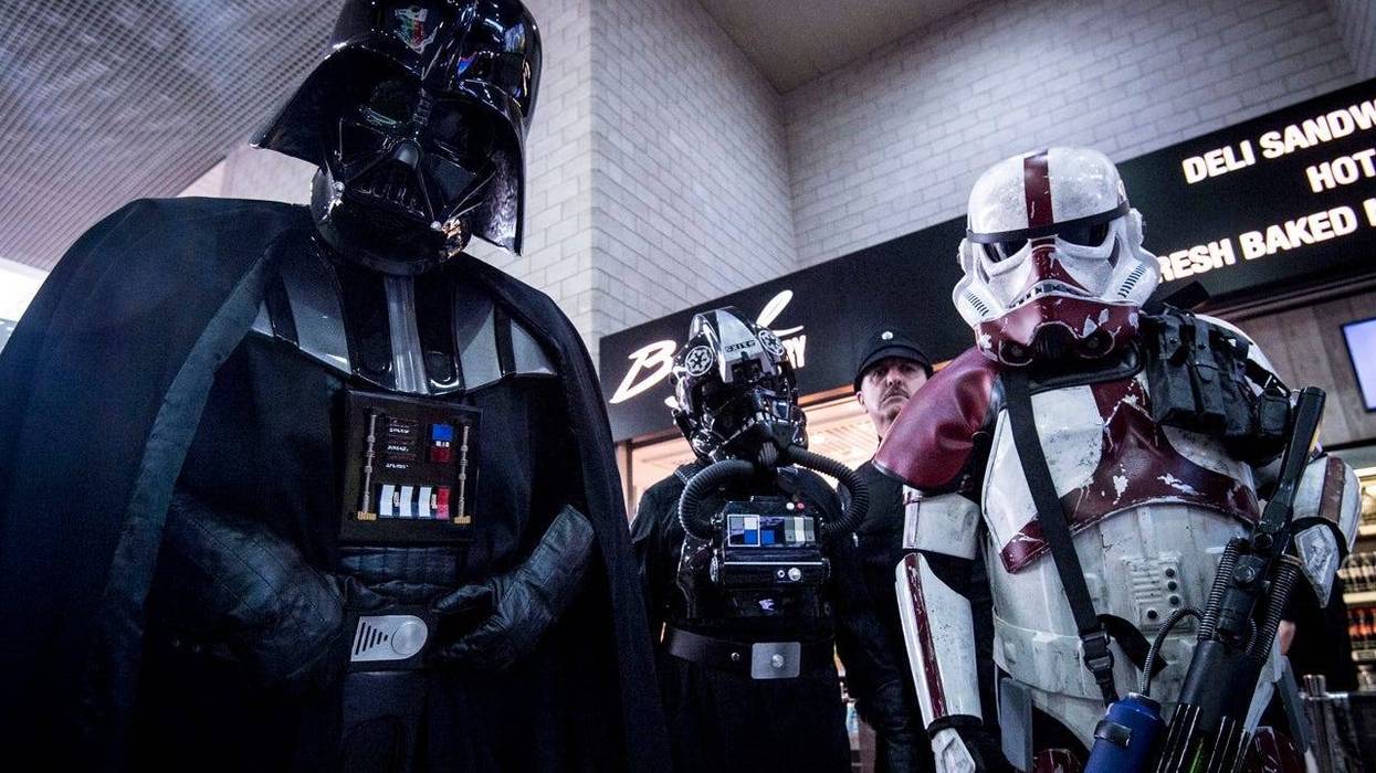 People dressed as Darth Vader and Stormtroopers during the MCM London Comic Con at ExCel London. (Photo by PA Images/Sipa USA) *** US Rights Only