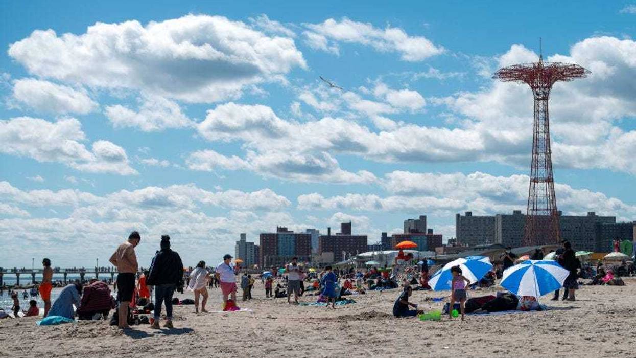 People enjoy the beach at Coney Island on Memorial Day in Brooklyn on May 31, 2021.