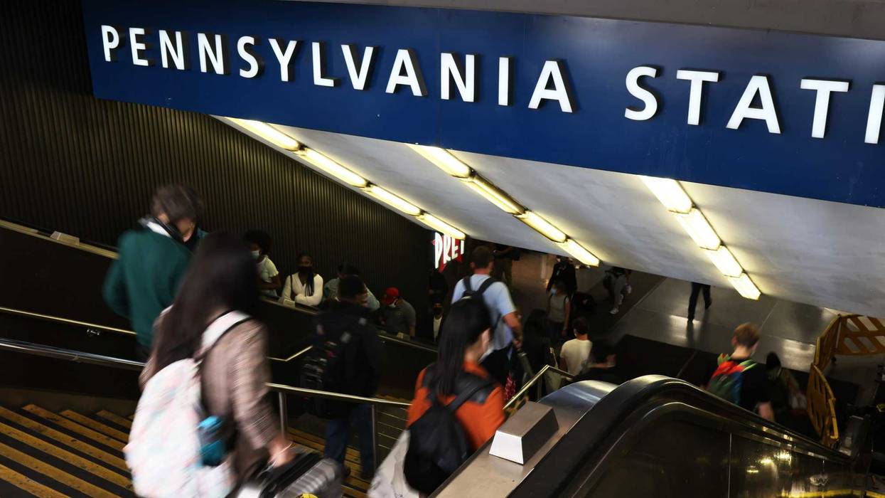 People enter Penn Station on Seventh Avenue in Midtown