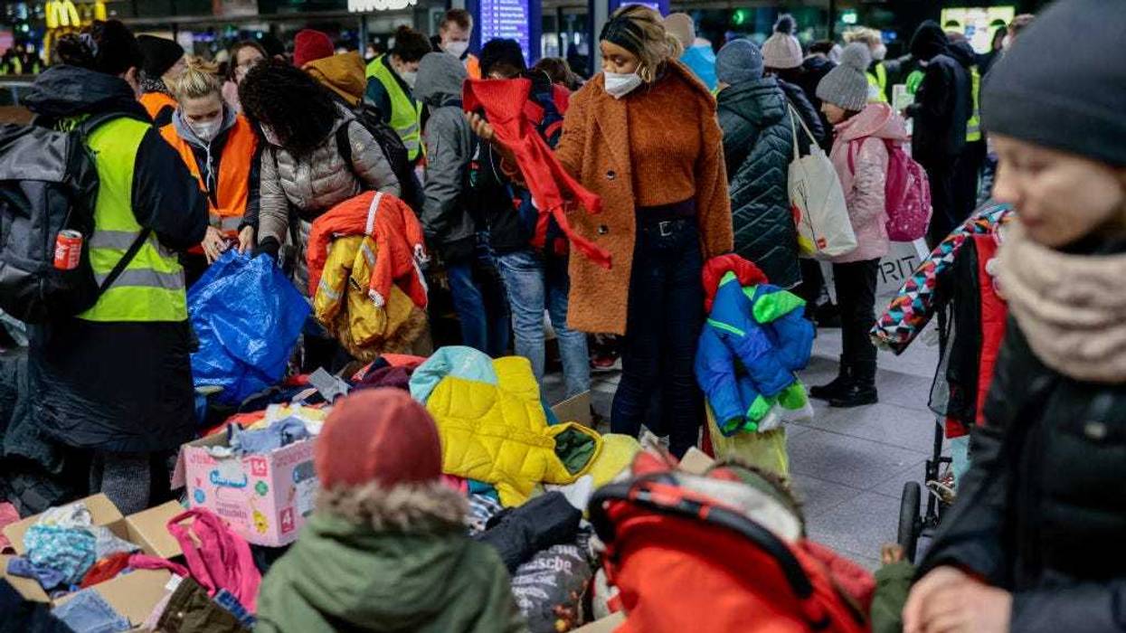 People fleeing Ukraine get food, clothing, and toiletries at Hauptbahnhof main railway station in Berlin, Germany.