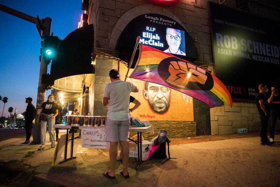 People gather at a candlelight vigil to demand justice for Elijah McClain on the one year anniversary of his death at The Laugh Factory on August 24, 2020 in West Hollywood, California. (Photo by Rich Fury/Getty Images)