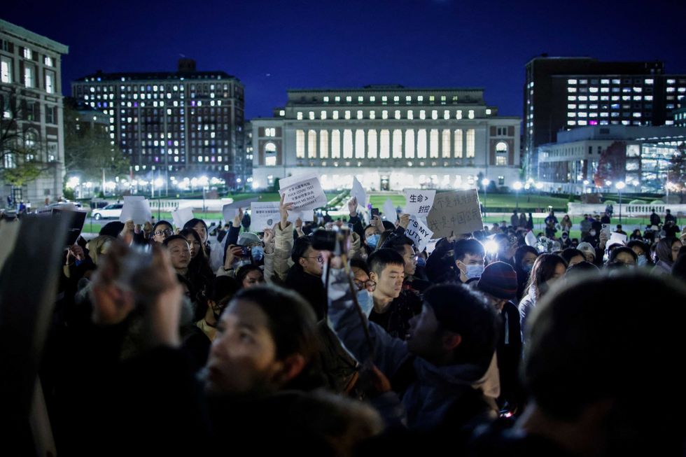 People gather at Columbia University during a protest in support of demonstrations held in China calling for an end to COVID-19 lockdowns on Nov. 28, 2022