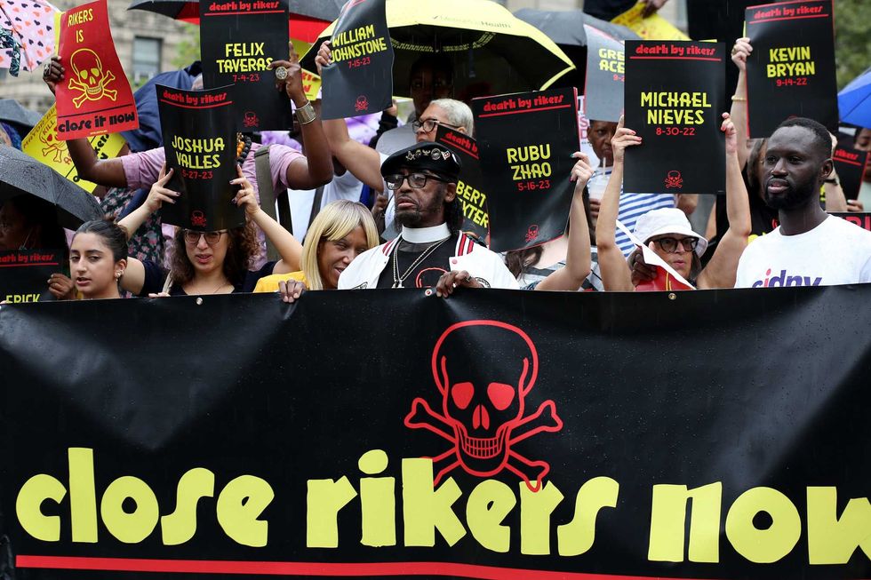 People gather at Foley Square to demand that NYC Mayor take action to shut down Rikers Island Jail Complex on August 10, 2023 in New York City.