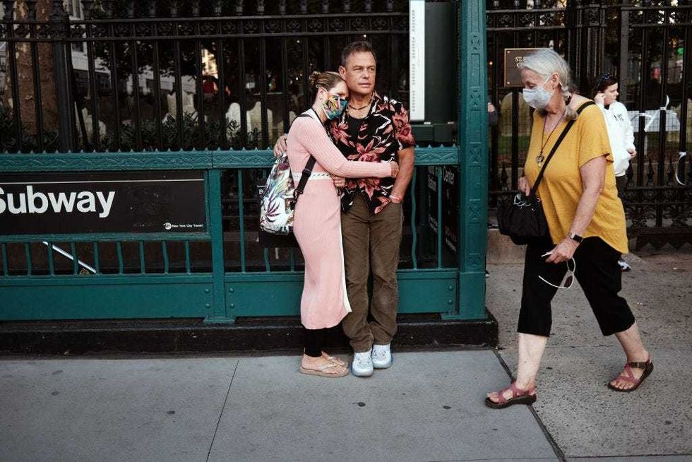 People gather in lower Manhattan near Ground Zero as the city commemorates the 20th anniversary of the September 11th terrorist attacks on the World Trade Center on September 11, 2021 in New York City.