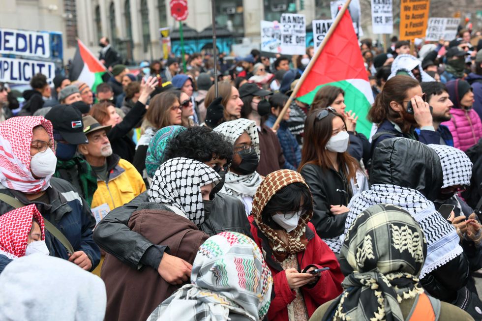 People gather outside of a New York court to protest the arrest and detention of Mahmoud Khalil at Foley Square on March 12, 2025