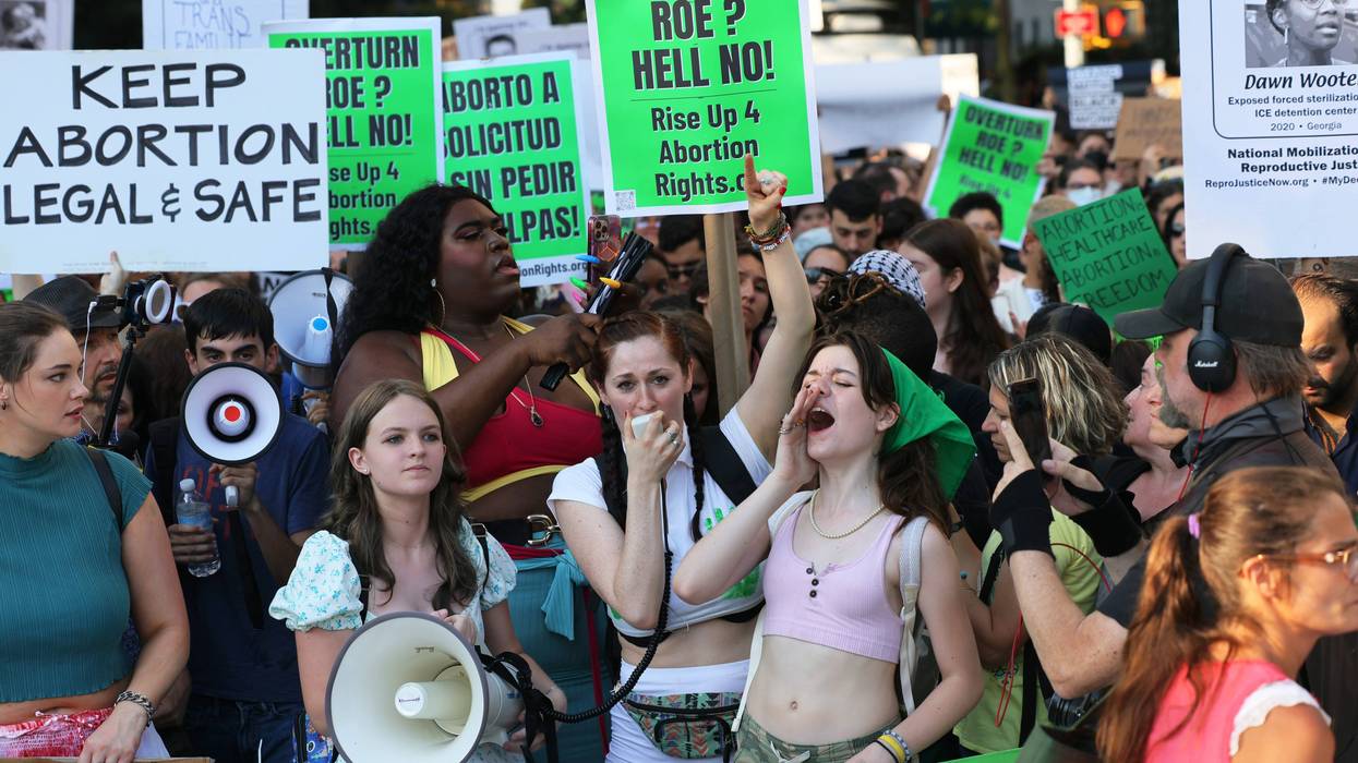 People gather to protest the Supreme Courts 6-3 decision in the Dobbs v. Jackson Women’s Health Organization at Washington Square Park.