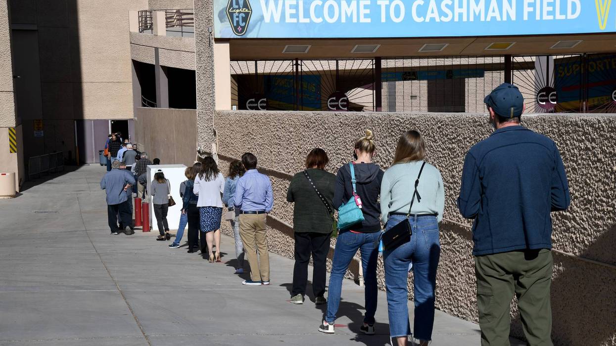 people line up for a coronavirus vaccination at Cashman Center in downtown Las Vegas