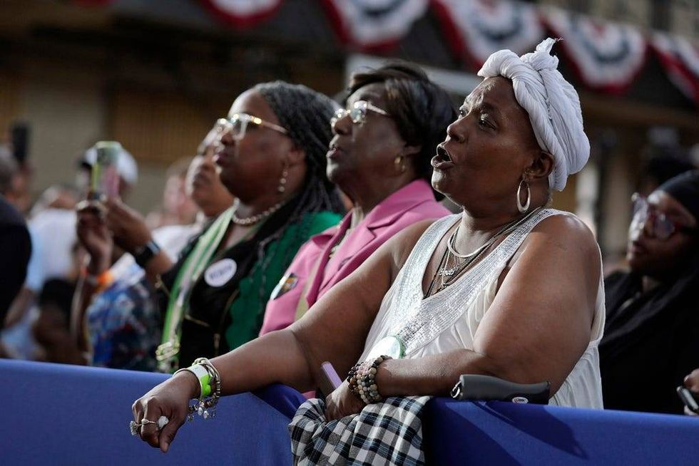 People listen as President Joe Biden speaks during a campaign event at Girard College, Wednesday, May 29, 2024, in Philadelphia.