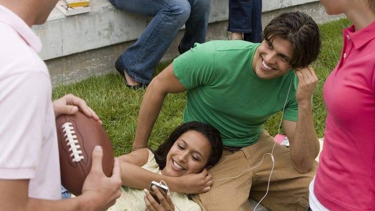 people listening to music, football