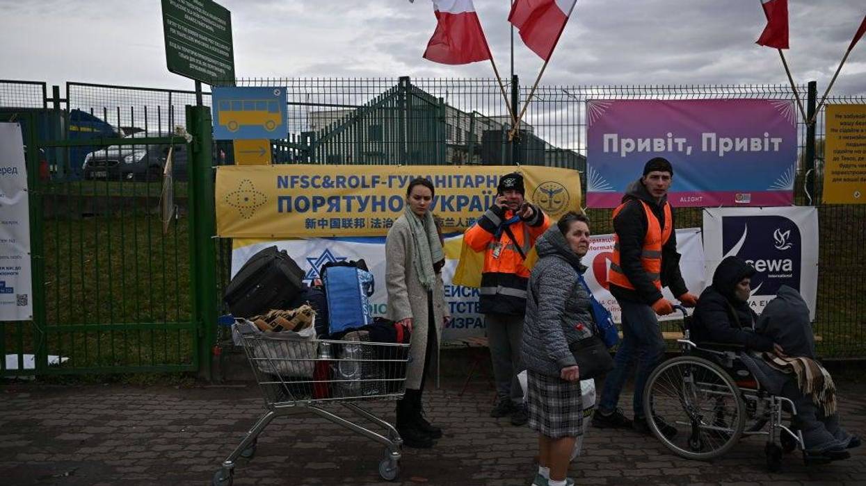 People, mostly women and children, cross from war-torn Ukraine into Poland at the Medyka border crossing on April 09, 2022 in Medyka, Poland.