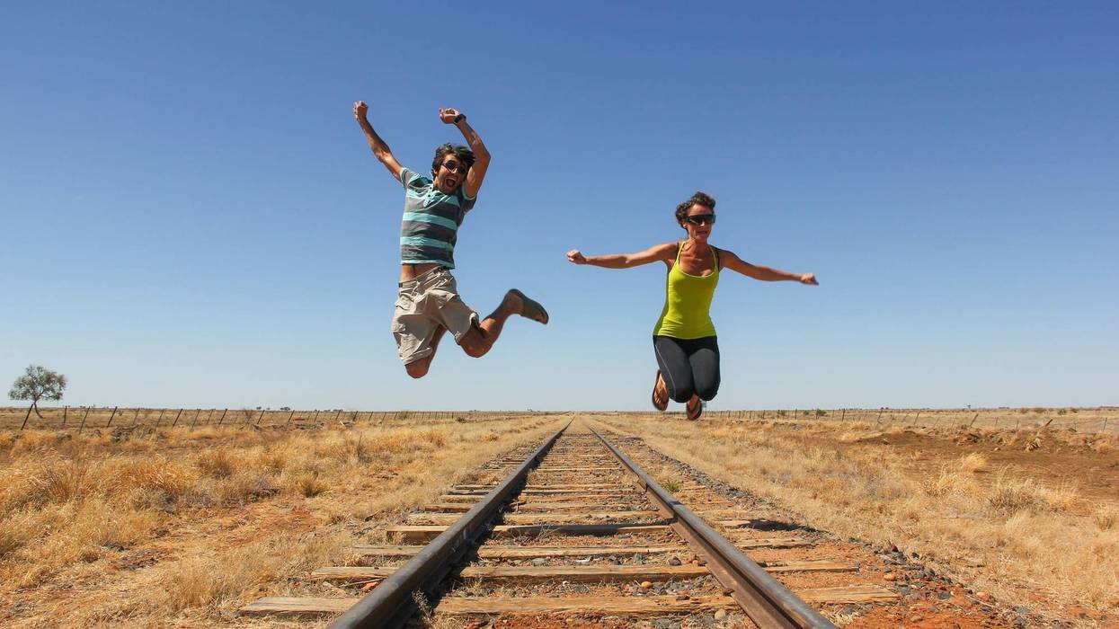 people on train tracks