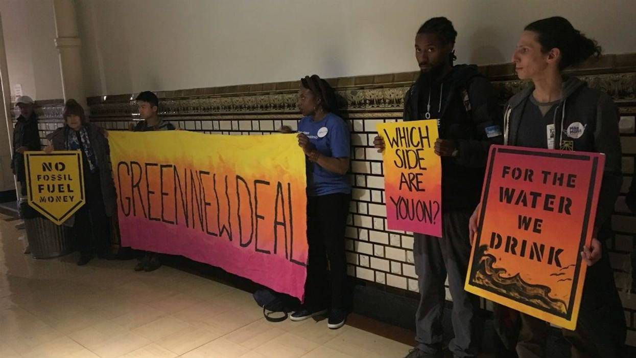 People opposed to a natural gas facility in Southwest Philadelphia protest at City Hall.