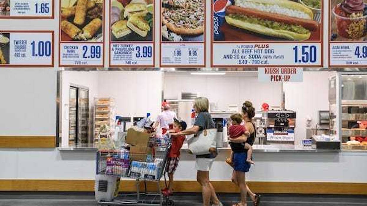 People ordering lunch at a Costco food court