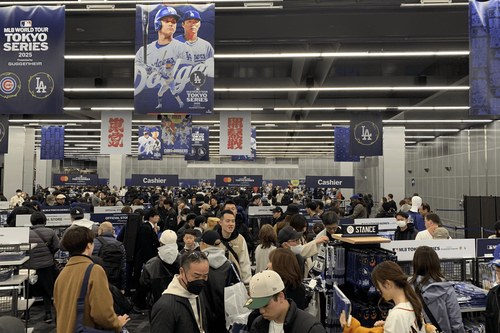 people packed into merch store