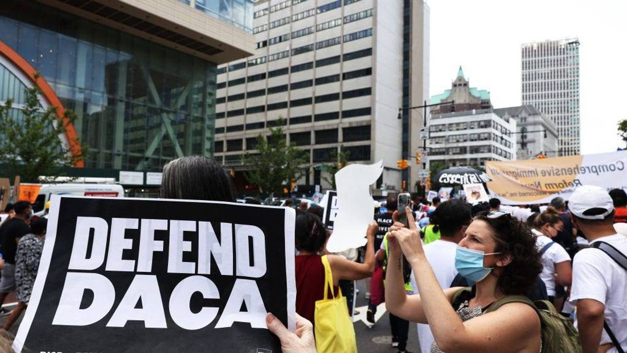 People participate in a march in support of a pathway to citizenship for immigrants on July 23, 2021 in New York City. Various organizations, elected officials and immigrant essential works gathered for a national day of action demanding a pathway to citizenship to be included in the infrastructure package, after it was announced last week that Congressional Democrats that the package will include the provision.