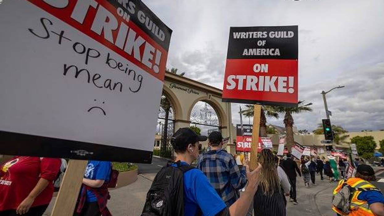 People picket outside of Paramount Pictures studios during the Hollywood writers strike on May 4, 2023 in Los Angeles, California.