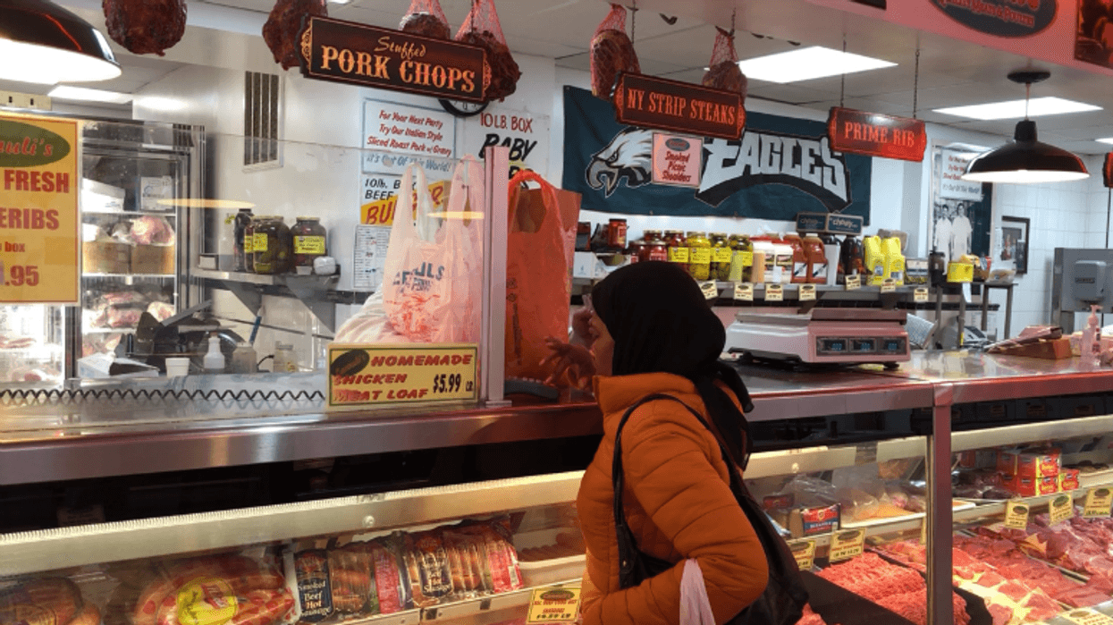People picking up food at Canuli’s in the Italian Market.
