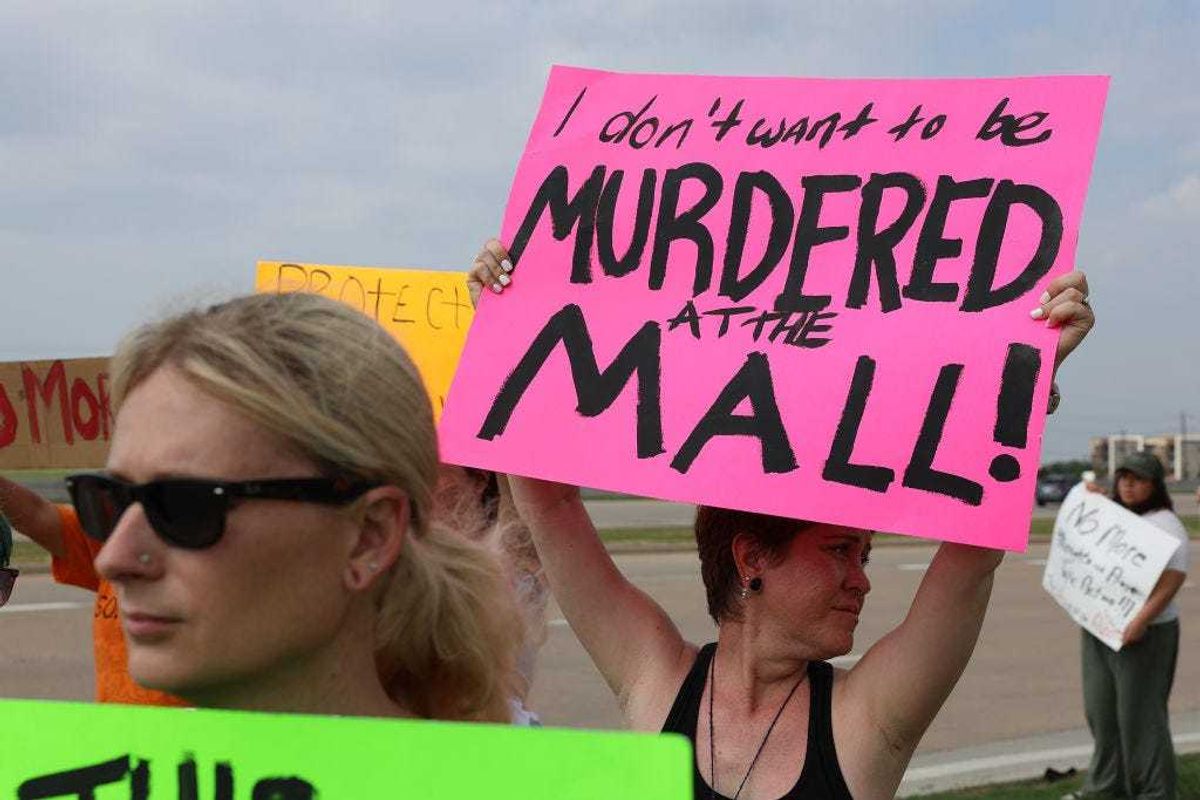 People protest against gun violence outside of the Cotton wood Creek Baptist Church on May 7, 2023 in Allen, Texas. A vigil is being held at the church for victims of the mass shooting in the Allen Premium Outlets mall on May 6th. According to reports, a shooter opened fire at the outlet mall, killing eight people. The gunman was then killed by an Allen Police officer that was responding to an unrelated call. (Photo by Joe Raedle/Getty Images)