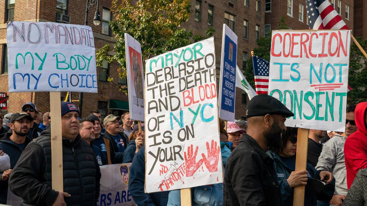 People protest the Covid-19 vaccine mandate for municipal workers during a protest at Gracie Mansion on October 28, 2021 in New York City