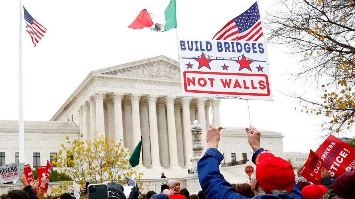 People rally outside the Supreme Court as oral arguments are heard in the case of President Trump's decision to end the Obama-era, Deferred Action for Childhood Arrivals program