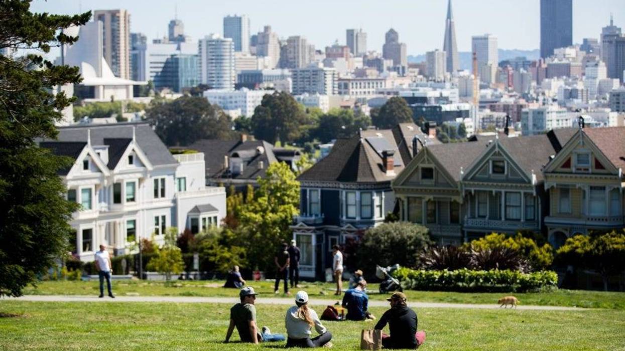 People Sit in Alamo Square Park during Shelter in Place Orders