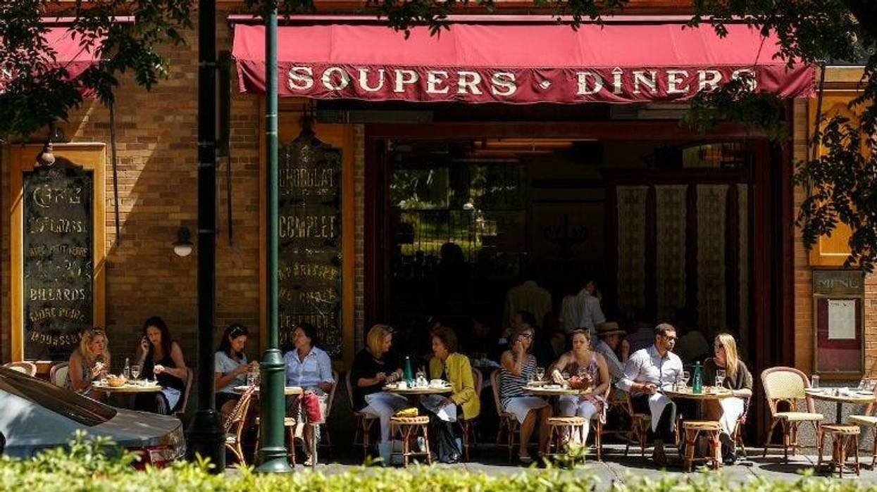 People sitting outdoors at a restaurant in Philadelphia.