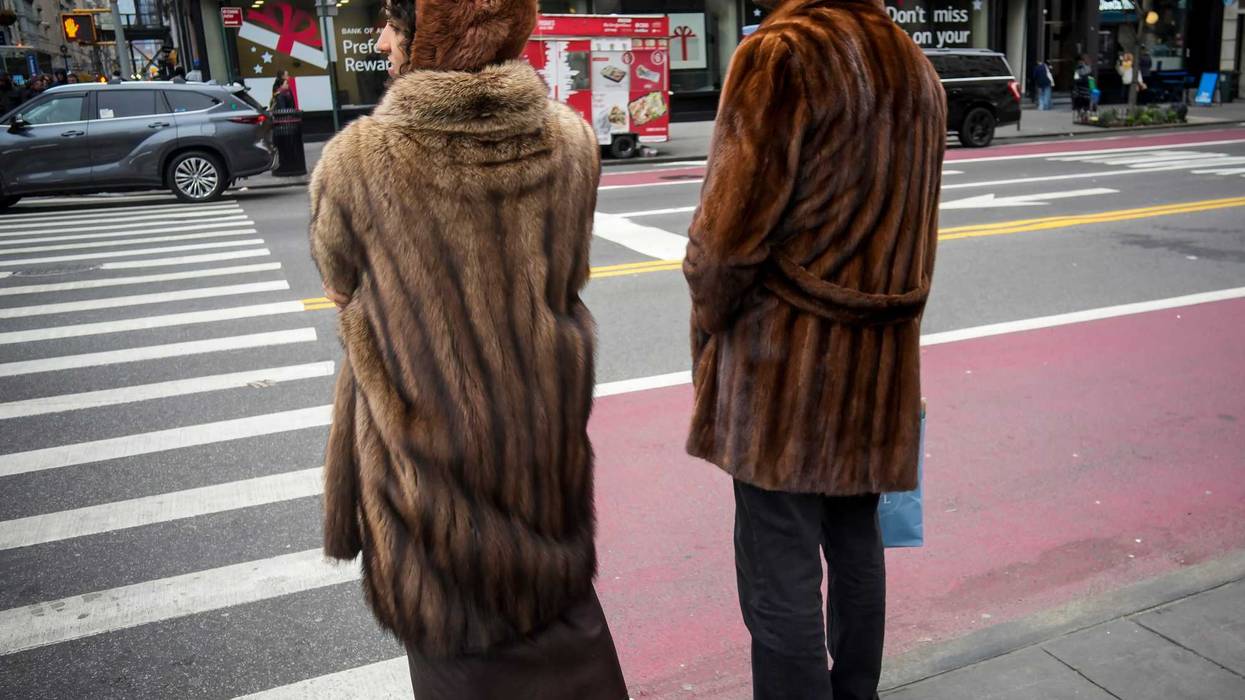 People stay warm in the Flatiron District