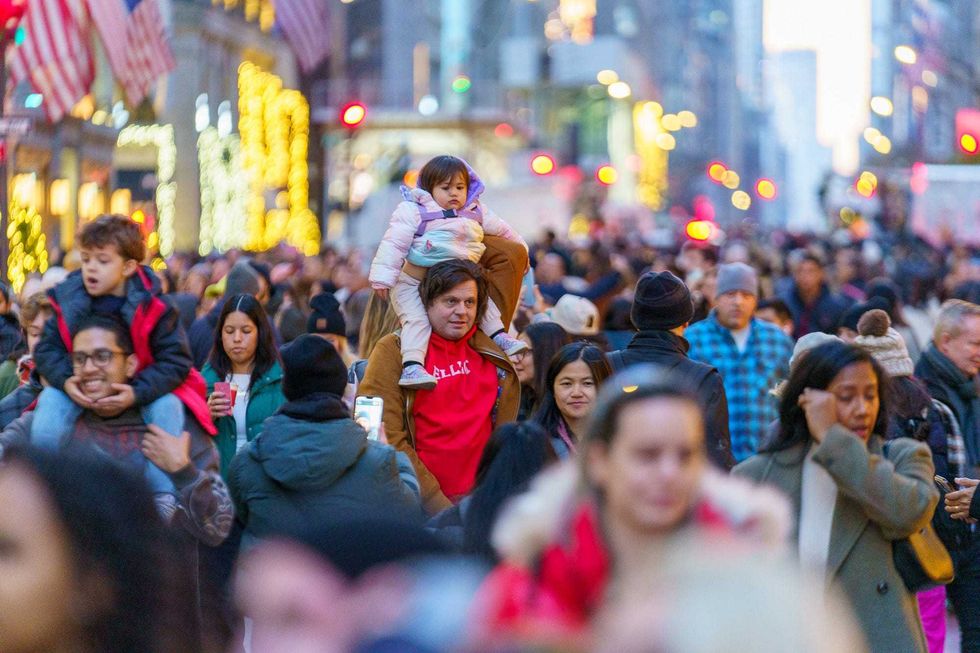People take part in the 200th anniversary of Fifth Avenue event on Dec. 8, 2024
