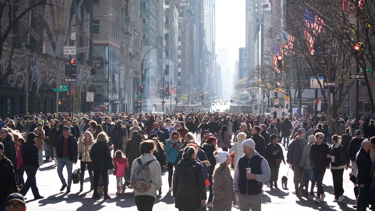 People take part in the 200th birthday bash for Fifth Avenue on Dec. 8, 2024