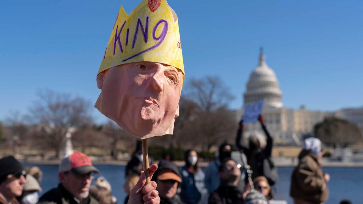 People take part in the "No Kings Day" protest on Presidents Day in Washington, in support of federal workers and against recent actions by President Donald Trump and Elon Musk, Monday, Feb. 17, 2025, by the Capitol in Washington.