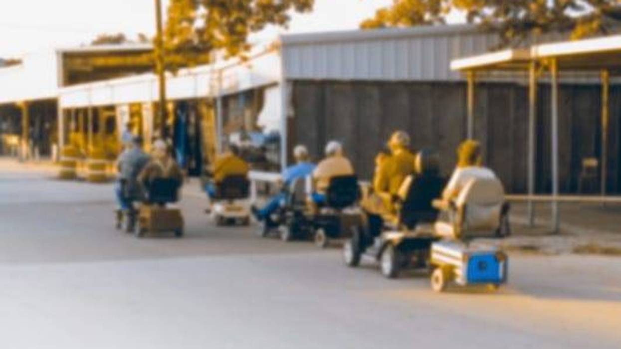 People Using Shopping Scooters